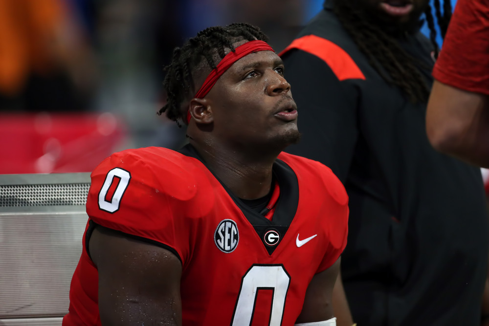 While Grady Jarrett waits for Draft call, his family's house burns