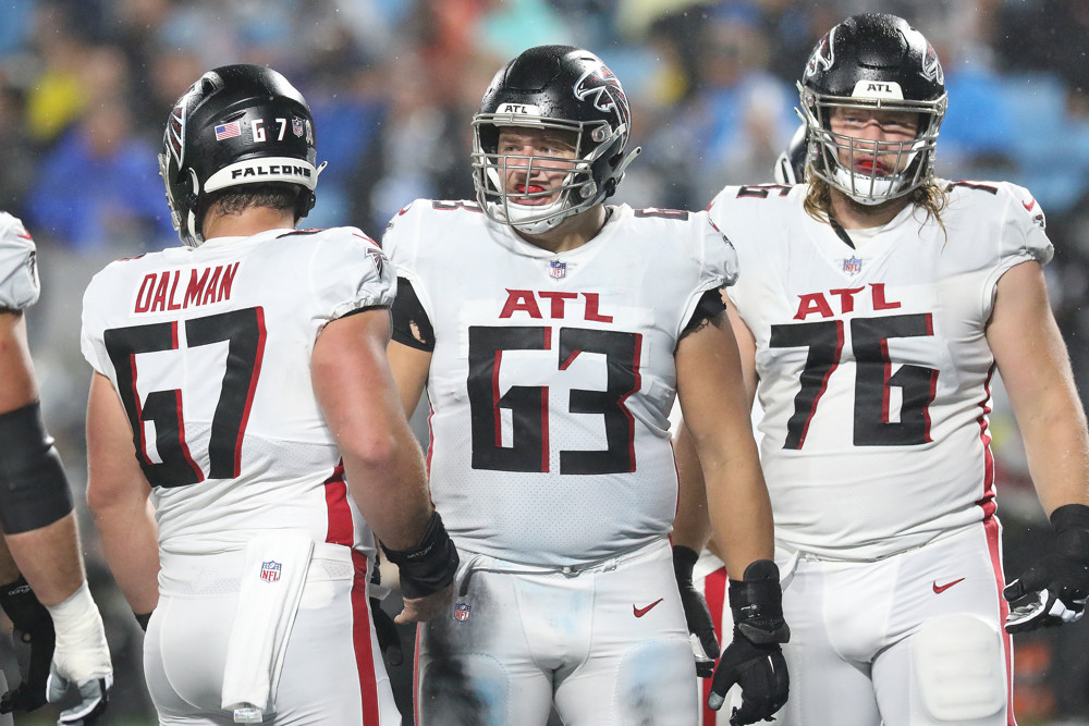 Atlanta Falcons punter Bradley Pinion (13) punts during the first